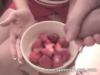 girl eats strawberries with sperm